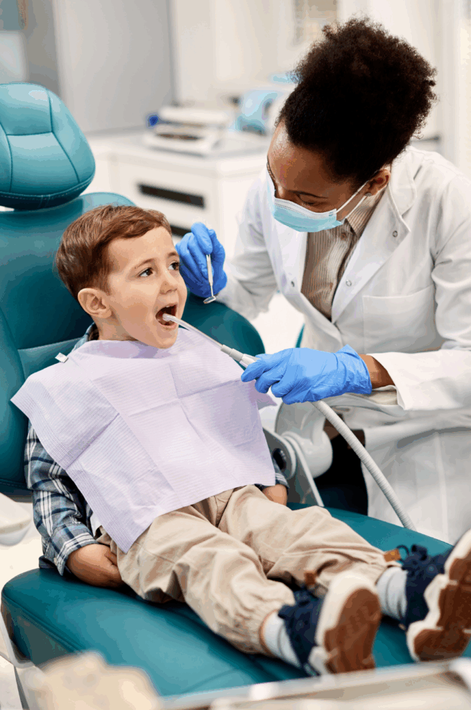 Child sitting in a dentist chair